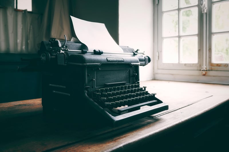 Vintage Typewriter with Book and Notes